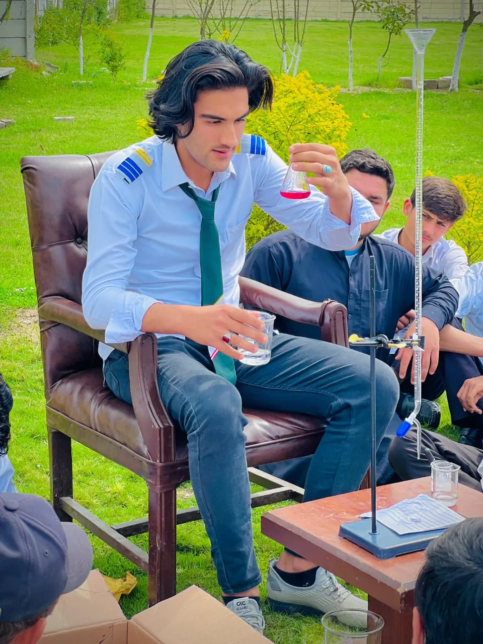 Students working on a chemistry experiment.